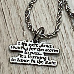 Life Isn't About Waiting For The Storm To Pass Single Charm Necklace